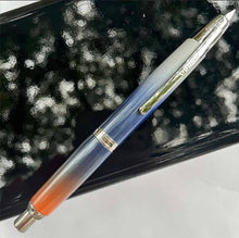 Stylo plume rétractable dégradé orange et bleu - Contraste chromé